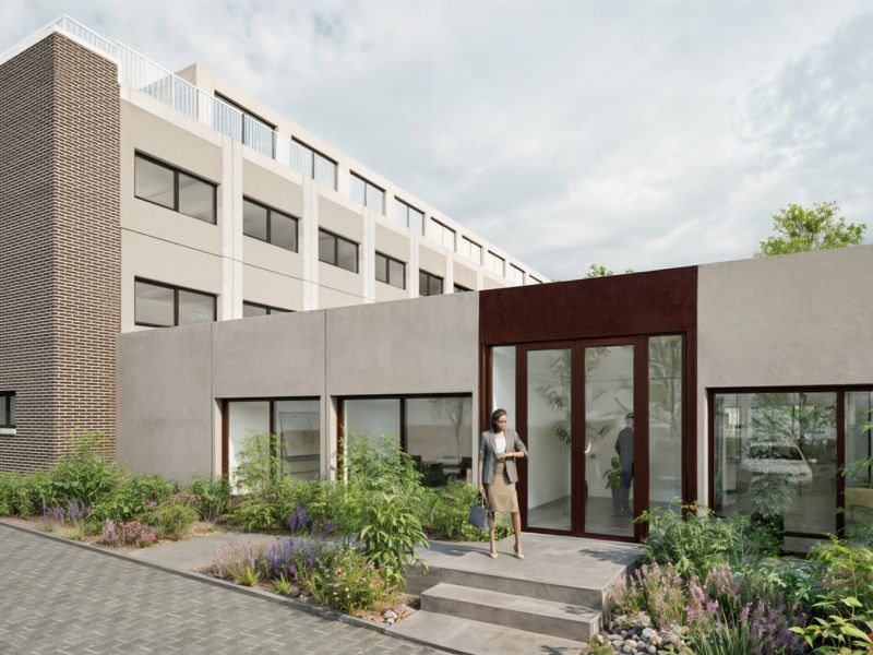Visualisering af kontorbygning med grøn beplantning og moderne facade. HBO Solutions har leveret teknisk rådgivning om energi og installationer.